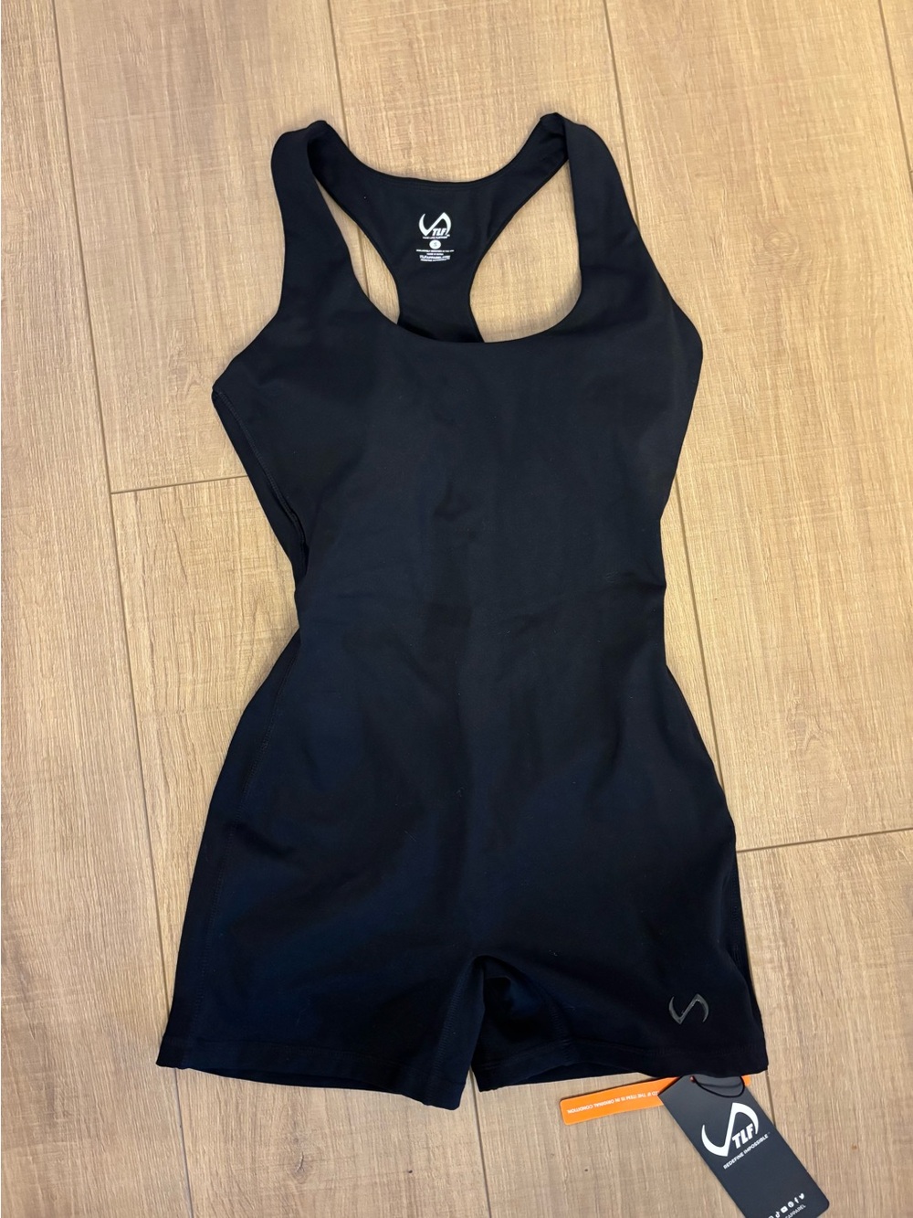 TLF workout one piece size small